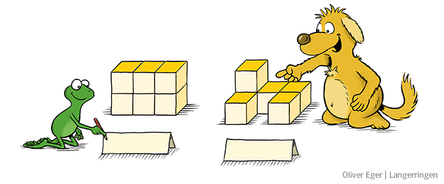 Mini und Max arbeiten mit Holzklötzen